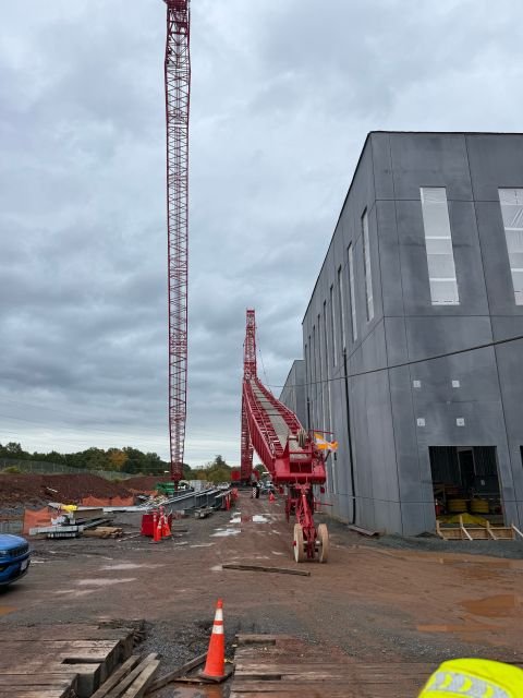 Crane wire rope and reeving equipment on the ground at a Virginia construction site